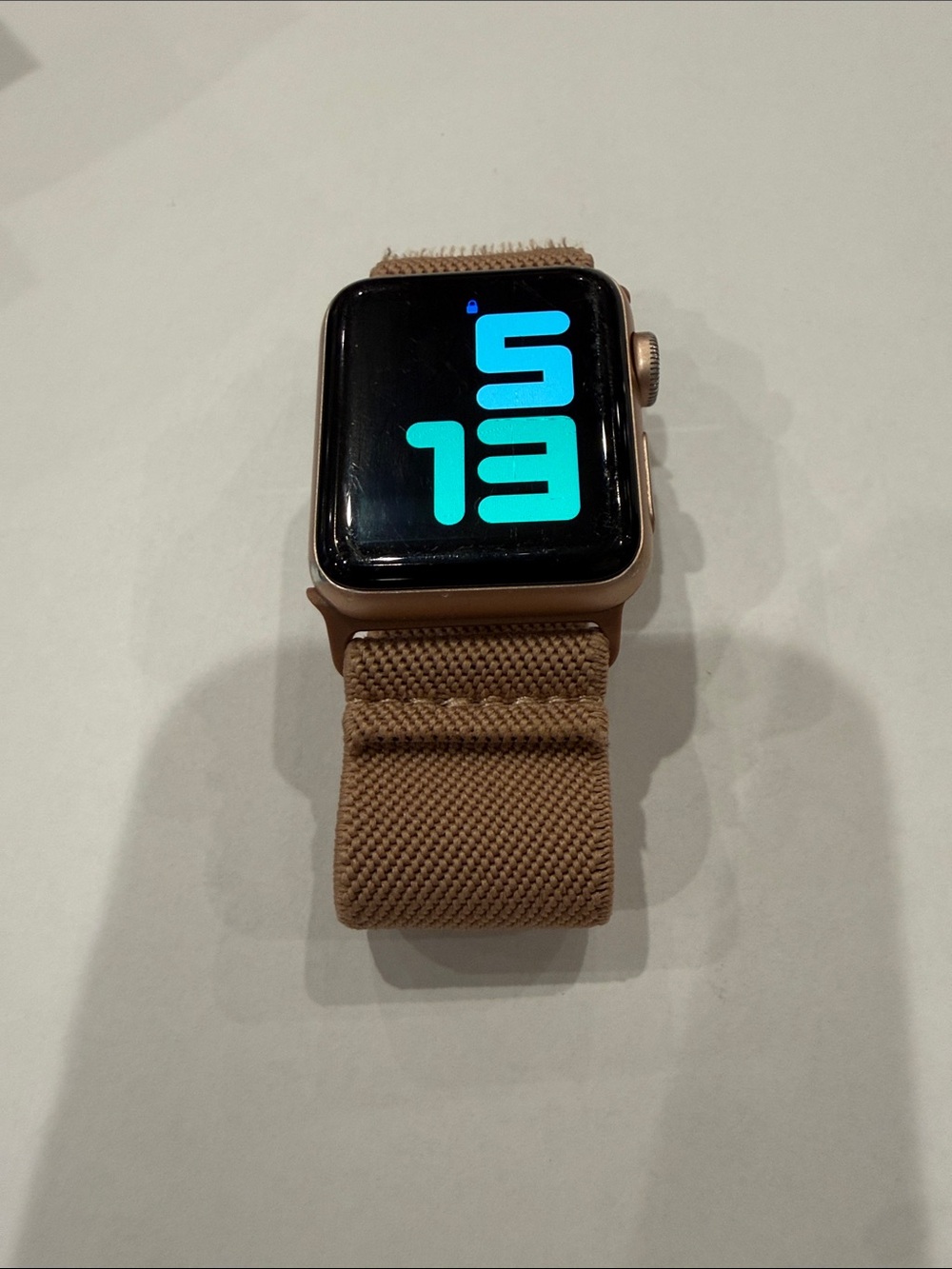 Apple Watch with Tan Woven Nylon Band - Gold Case